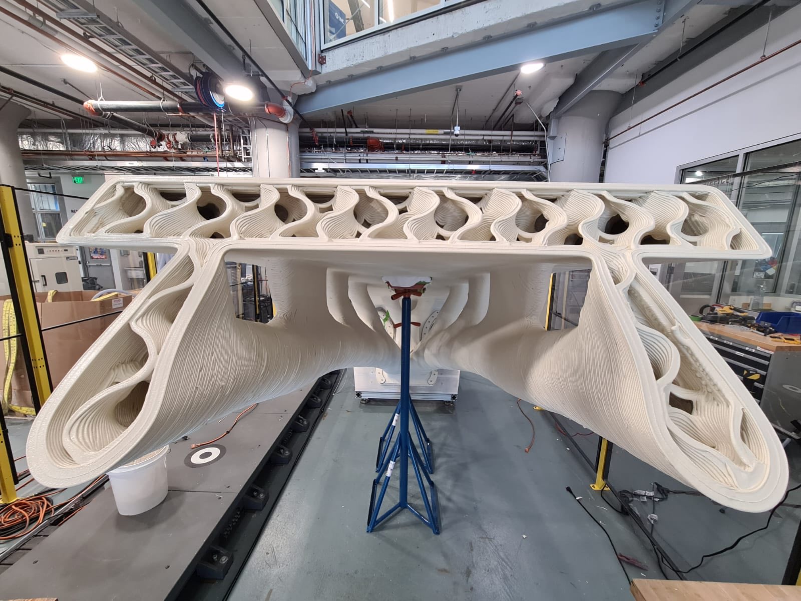 The printed bridge structure viewed end-on, showing the internal cellular ribs beneath the deck